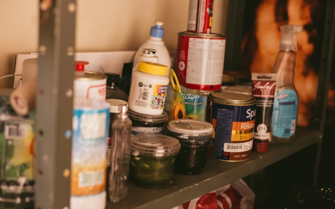 Clean, dry paint cans placed in a recycling bin with other metals